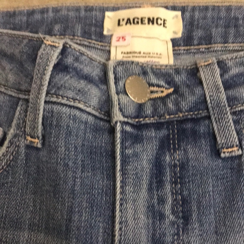 Gentle used Jean L'Agence "High Line" jeans in distressed stretch denim. Size 25